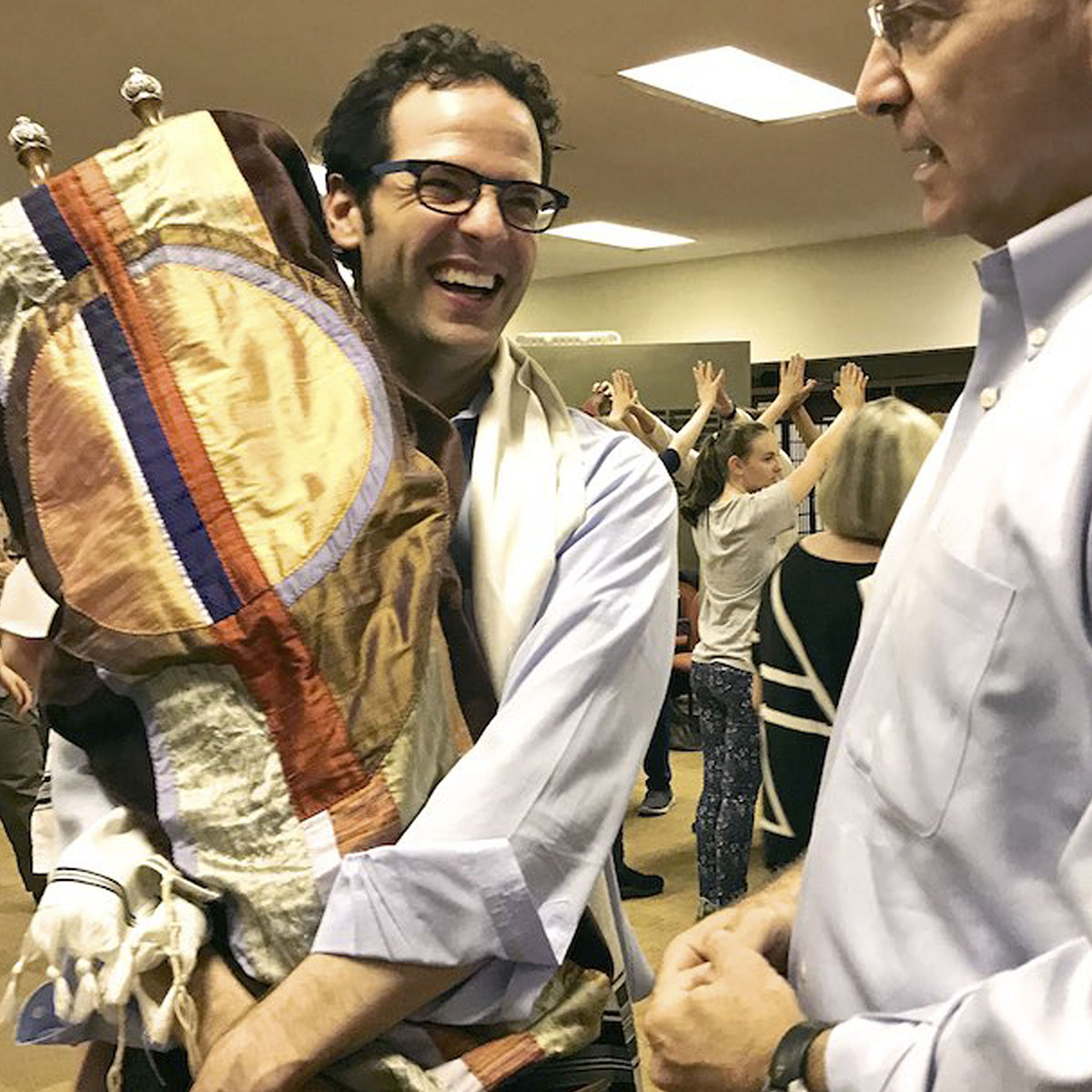 Congregant carrying Torah